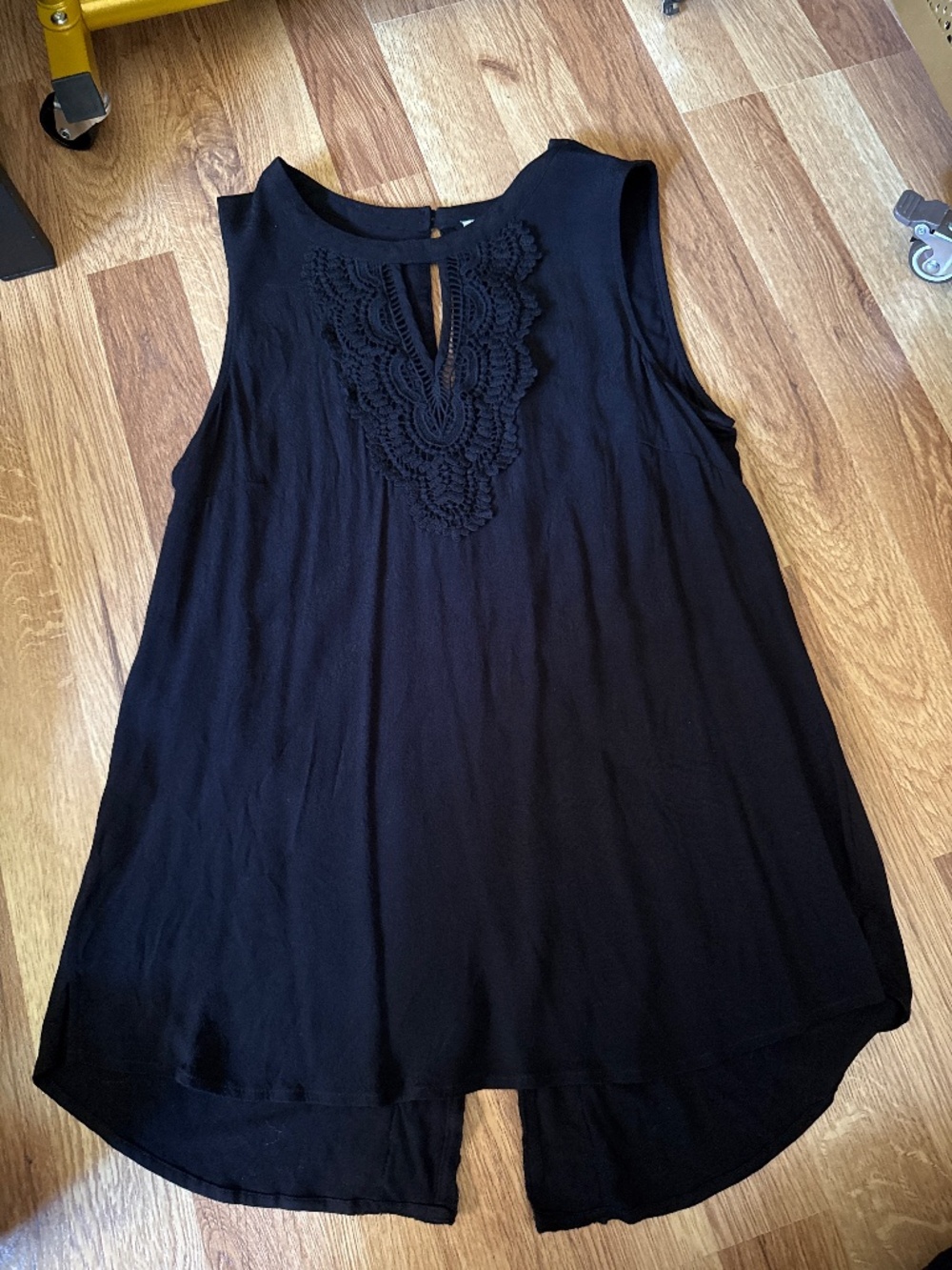 Black sleeveless blouse